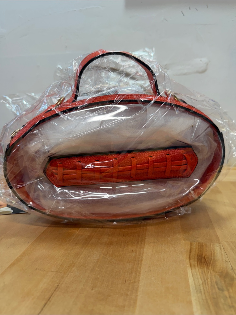 Clear Oval Crossbody Bag with Orange Trim - Picture 3 of 3